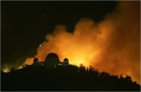 LA Times photo of the griffith park observatory with fire behind it LA Times photo of the griffith park observatory with fire behind it